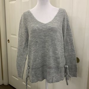 Grey sweater with tie detail